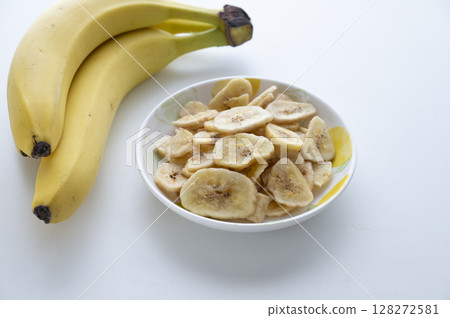 Banana chips and bananas 128272581