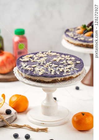 Blueberry cake with almond flakes on stand Blueberry cake with almond flakes on stand 128272927