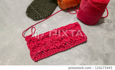 Pattern for knitting a bag. Crocheted from polyester cord. On a gray background 128273943