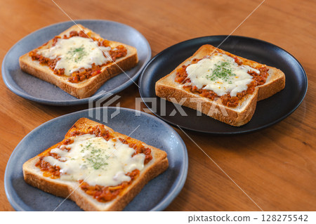 Meat sauce and cheese toast breakfast 128275542
