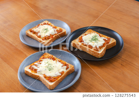 Meat sauce and cheese toast breakfast 128275543
