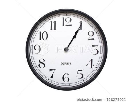 Round analog wall clock with a black frame, white face, and bold black numerals. showing  01:05 or 13:05. Isolated on a white background. Ideal for time-related themes. 128275921