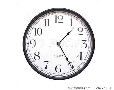 Round analog wall clock with a black frame, white face, and bold black numerals. showing  01:25 or 13:25. Isolated on a white background. Ideal for time-related themes. 128275925