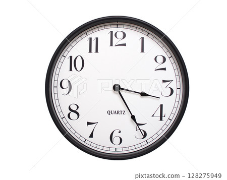 Round analog wall clock with a black frame, white face, and bold black numerals. showing  03:25 or 15:25. Isolated on a white background. Ideal for time-related themes. 128275949