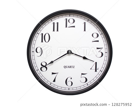 Round analog wall clock with a black frame, white face, and bold black numerals. showing  03:40 or 15:40. Isolated on a white background. Ideal for time-related themes. 128275952