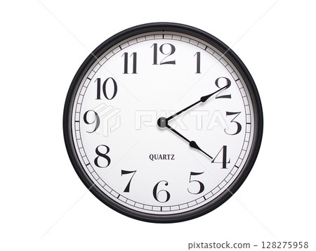 Round analog wall clock with a black frame, white face, and bold black numerals. showing 04:10 or 16:10. Isolated on a white background. Ideal for time-related themes. Round analog wall clock with a black frame, white face, and bold black numerals. showing 04:10 or 16:10. Isolated on a white background. Ideal for time-related themes. 128275958