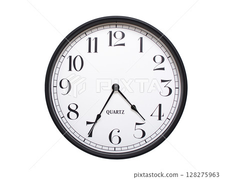 Round analog wall clock with a black frame, white face, and bold black numerals. showing  04:35 or 16:35. Isolated on a white background. Ideal for time-related themes. 128275963