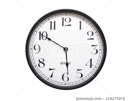 Round analog wall clock with a black frame, white face, and bold black numerals. showing  05:50 or 17:50. Isolated on a white background. Ideal for time-related themes. 128275978