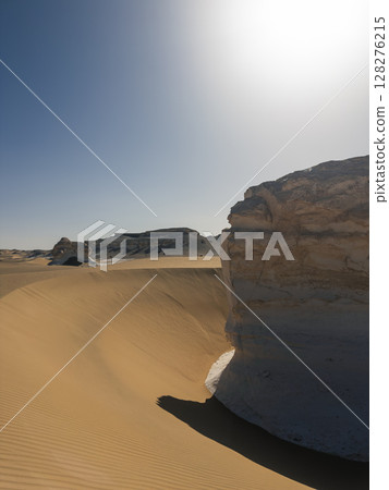 White rock formations and sand dunes in Egypt's White Desert, natural desert landscape White rock formations and sand dunes in Egypt's White Desert, natural desert landscape 128276215