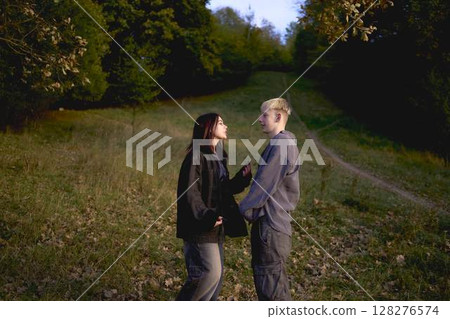 15-year-old teenage couple in love has an emotional fight in an autumn park 15-year-old teenage couple in love has an emotional fight in an autumn park 128276574