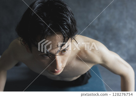 Men doing push-ups Men doing push-ups 128276754