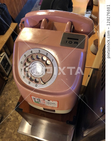 Nostalgic pink phone 128276881