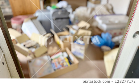 Blurred image of a messy room behind a sliding door Blurred image of a messy room behind a sliding door 128277172