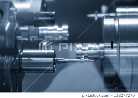 The modular touch probe checking the cam shaft shaft parts on CNC lathe machine in the light blue scene. 128277270