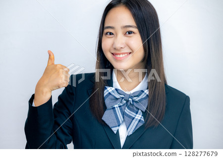 High school girl doing a good sign 128277679