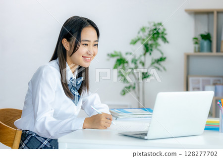 High school girl listening to class online High school girl listening to class online 128277702