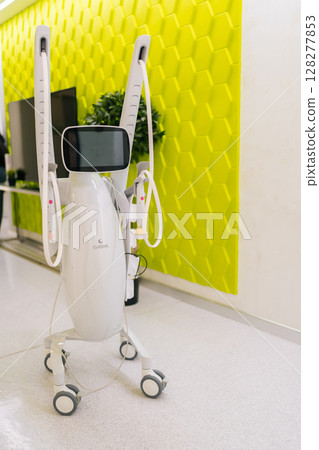Ufa, Russia - 10 April 2025. Vertical shot of professional cosmetology device for mesotherapy treatment placing in modern beauty clinic. Concept of non-surgery cosmetology, professional skincare. 128277853