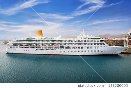 Cruise Ship in port on sunny day 128280003