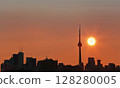 Toronto's skyline lit by sun raising behind the buildings 128280005