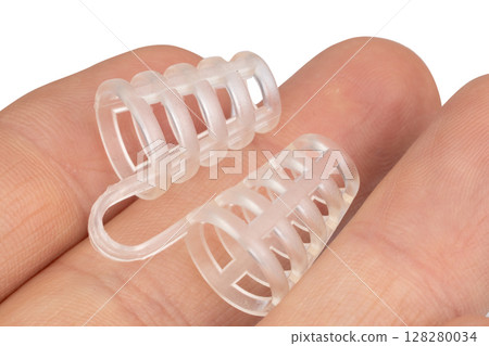 Anti snoring nose clip held on fingers 128280034