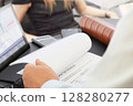 Businessman analyzing  financial documents  in the office  128280277