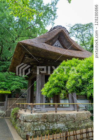 Hokoku-ji shrine bell tower surrounded by trees in Kamakura, Japan 128280866