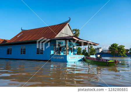 Traditional Bugis floating houses on Lake Tempe, Sulawesi, Indonesia Traditional Bugis floating houses on Lake Tempe, Sulawesi, Indonesia 128280881