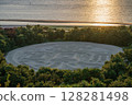 Zenigata sand painting illuminated by the setting sun 128281498
