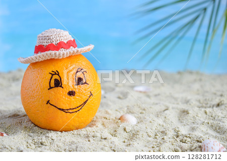 Creative minimal summer idea. Orange citrus hipster in bamboo hat on sand. Tropical beach concept. Creative art. Fun party Mood. Copy space 128281712