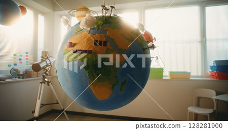 STEM Classroom: Rotating Earth Model with Miniature 3D Models of Wind Turbines and Solar Panels 128281900