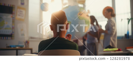 STEM Class: Female Teacher Explaining Energy Resources to Elementary School Students Using Earth Model STEM Class: Female Teacher Explaining Energy Resources to Elementary School Students Using Earth Model 128281978