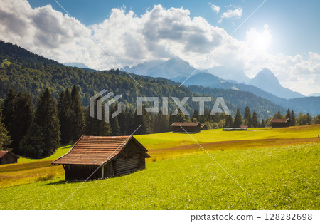 beautiful alpine valley 128282698