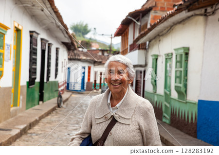 Senior woman at the beautiful colonial town of Concepcion located in the department of Antioquia in Colombia. 128283192