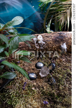 Healing crystals on brown background Healing crystals on brown background 128283387