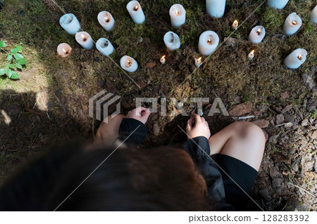 An Enchanting Forest Ritual that incorporates Candles, Crystals, and various elements of natures magic 128283392