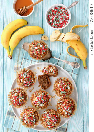 banana bread oat muffins with christmas sprinkles banana bread oat muffins with christmas sprinkles 128284610