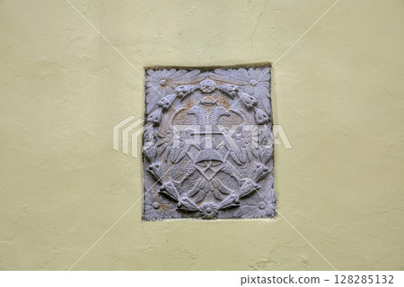 Ornate Venetian coat of arms carved in stone. Motovun, Croatia. 128285132