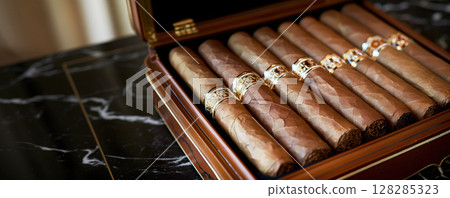 Luxury Cuban tobacco cigars in box, rolled nicotine product, harmful unhealthy vintage business. 128285323