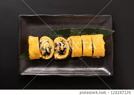 Squid and kelp, rolled egg Squid and kelp, rolled egg 128287120