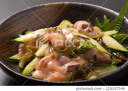 Salted squid with mekabu seaweed and cucumber 128287546
