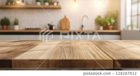 Modern kitchen interior with wooden countertop and plants in sunlight 128287812
