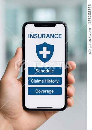hand holding a smartphone with a health insurance app on screen hand holding a smartphone with a health insurance app on screen 128288828