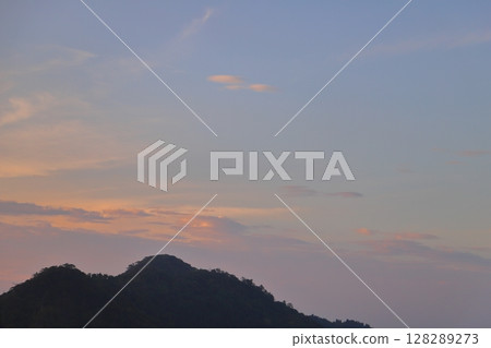 Sunset sky, clouds, mountains Sunset sky, clouds, mountains 128289273