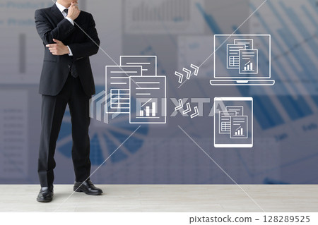 Image of a businessman thinking about digitizing paper documents and materials Image of a businessman thinking about digitizing paper documents and materials 128289525