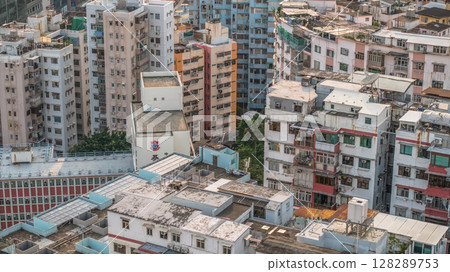 July 6 2025 Urban Cityscape with Residential Buildings Against Scenic Mountain 128289753