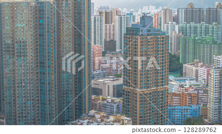 July 6 2025 Urban Cityscape with Residential Buildings Against Scenic Mountain 128289762