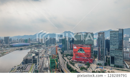 July 6 2025 Modern Urban Landscape Featuring High Rise Buildings and A Riverfront 128289791