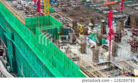 July 6 2025 Large Construction Site with Steel Scaffolding and Tower Cranes July 6 2025 Large Construction Site with Steel Scaffolding and Tower Cranes 128289793