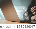 Close-up of checklist interface on laptop screen, highlighting digital productivity tools, task tracking, and tech-driven goal achievement in business environments. 128289847