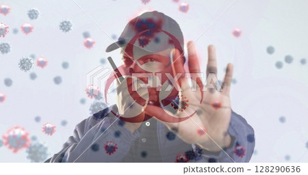 Image of a hazard sign with cells floating over biracial man using walkie talkie Image of a hazard sign with cells floating over biracial man using walkie talkie 128290636
